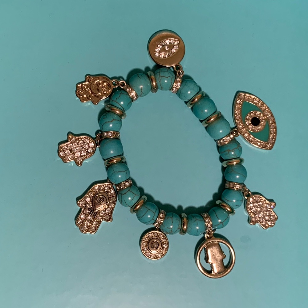 Turquoise stone bracelet with hanging jems